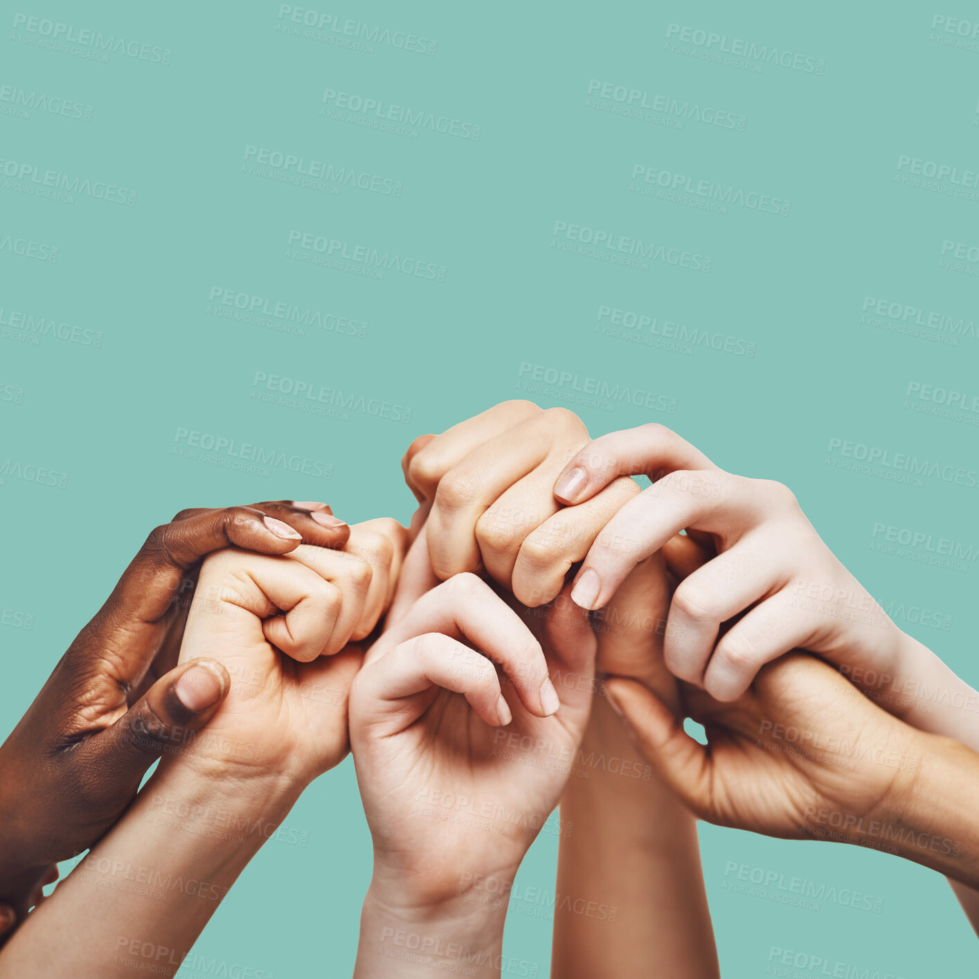 Buy stock photo Praying, hands and people united in prayer, worship or community encouragement in studio. Diversity, pray and worship by group in church for praise, help or hope, blessing and God on green background