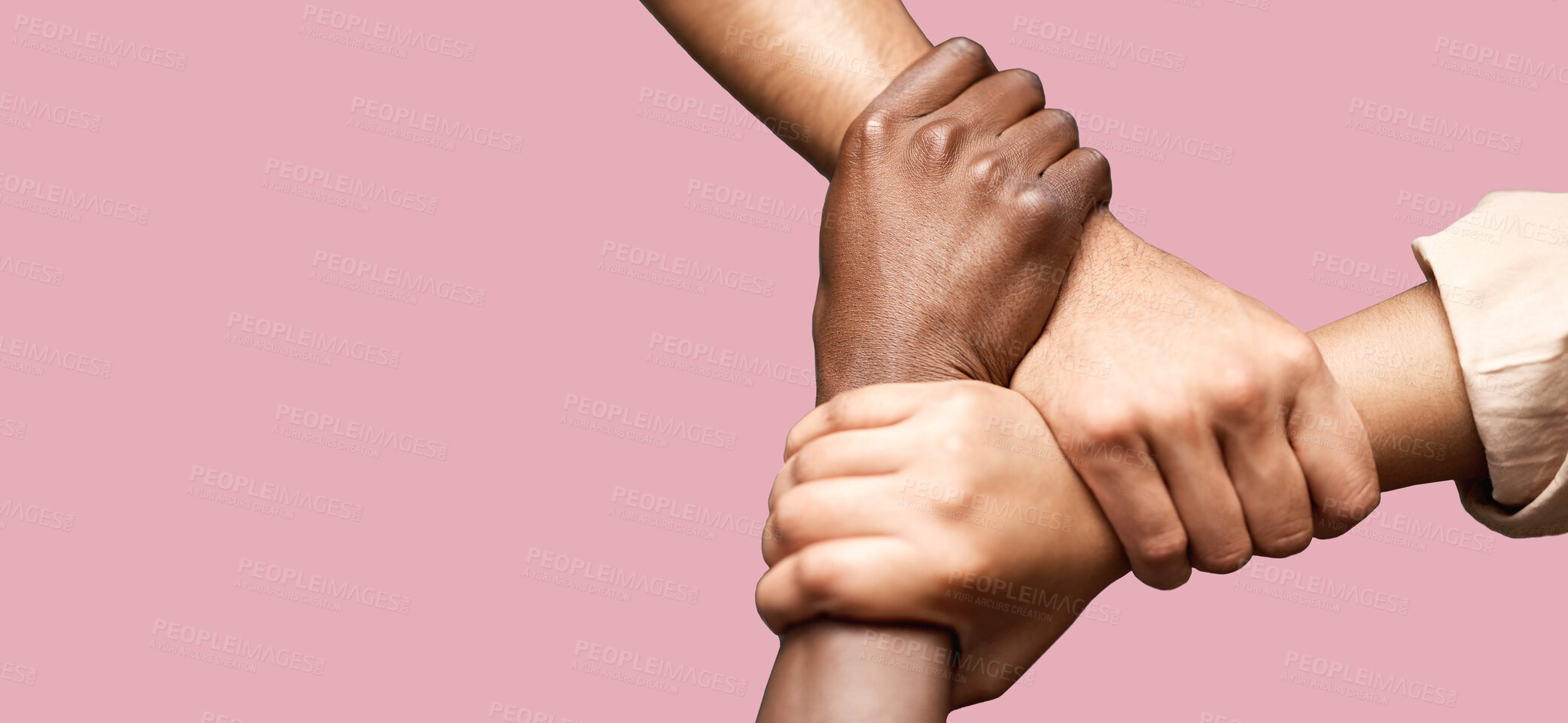 Buy stock photo People, diversity and hands together in teamwork collaboration for trust against a pink studio background. Diverse group of friends holding hand in unity, solidarity or community agreement on mockup