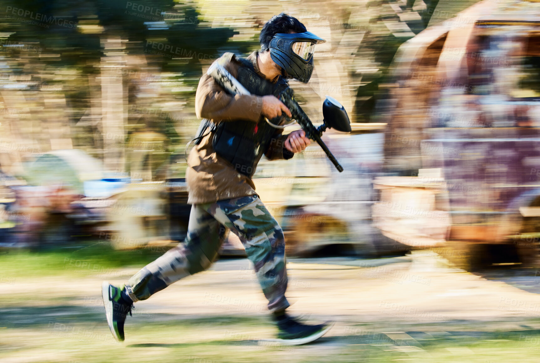 Buy stock photo Fast, running and paintball man, gun and outdoor battlefield, playground or games in forest adventure training. Shooting skill, player or sports person with military speed, action and target mission