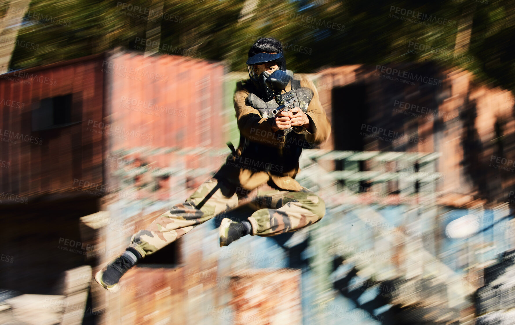Buy stock photo Blurred, military and man shooting in paintball, army training and fitness test for war.  Sports, game and soldier jumping with a gun for battle on a battlefield, playing and competing in games