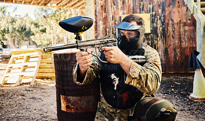 Buy stock photo Paintball, target training or man with gun in shooting game playing with on fun battlefield mission. Aim, hero or focused soldier with army weapons gear for survival in outdoor challenge competition