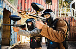 Paintball, target training or men with guns in shooting game with teamwork on fun army battlefield mission. Focused male soldiers aim war weapons gear for survival in military shooting challenge