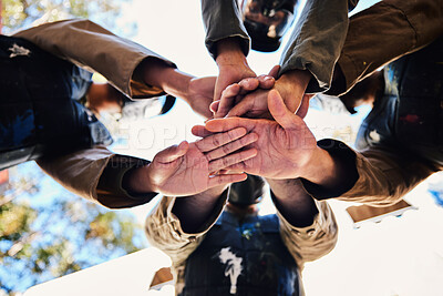 Buy stock photo Goals, paintball team or hands in huddle for strategy, hope or soldier training on war battlefield. Mission, low angle or army people planning with support in partnership or military group solidarity