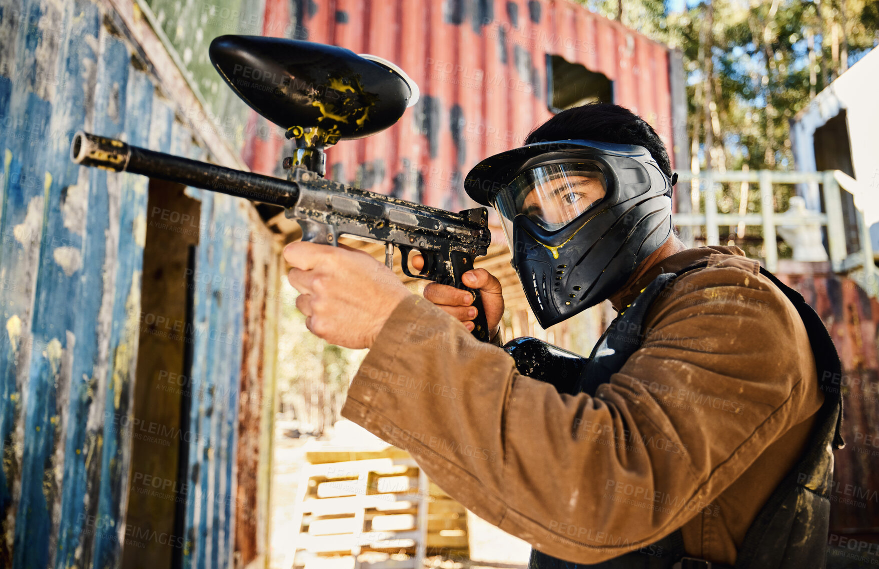 Buy stock photo Paintball, target practice or man with gun in shooting game playing with on fun battlefield mission. Aim or focused male soldier with army weapons gear for survival in military challenge competition 