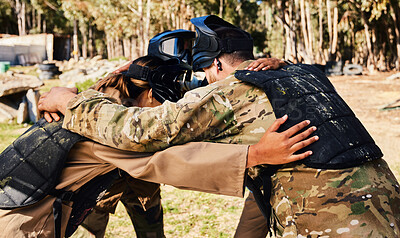 Buy stock photo Group, paintball or team in huddle planning strategy goals, or soldier training on war battlefield together. Community or army soldiers talking for support, collaboration or military people game