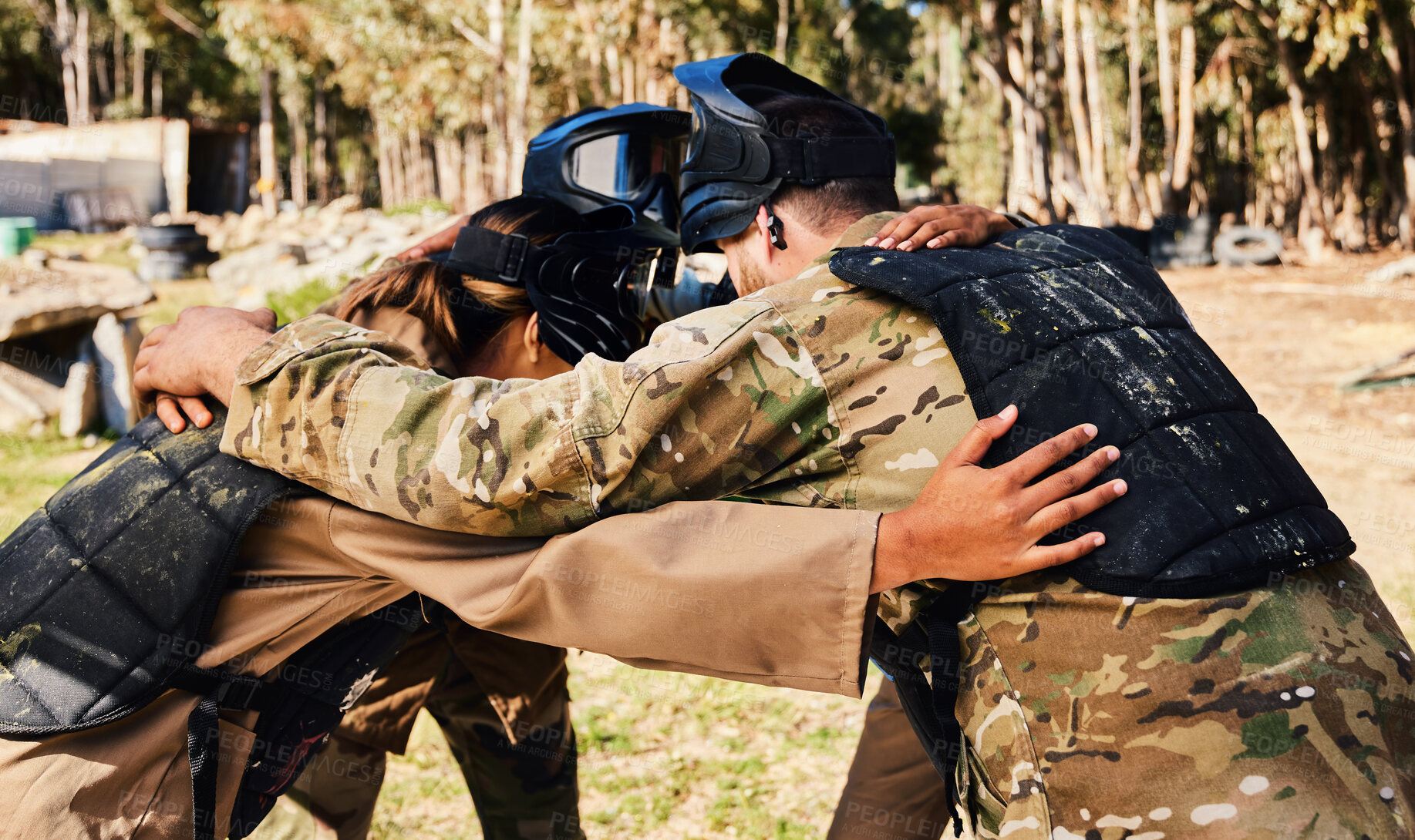 Buy stock photo Group, paintball or team in huddle planning strategy goals, or soldier training on war battlefield together. Community or army soldiers talking for support, collaboration or military people game