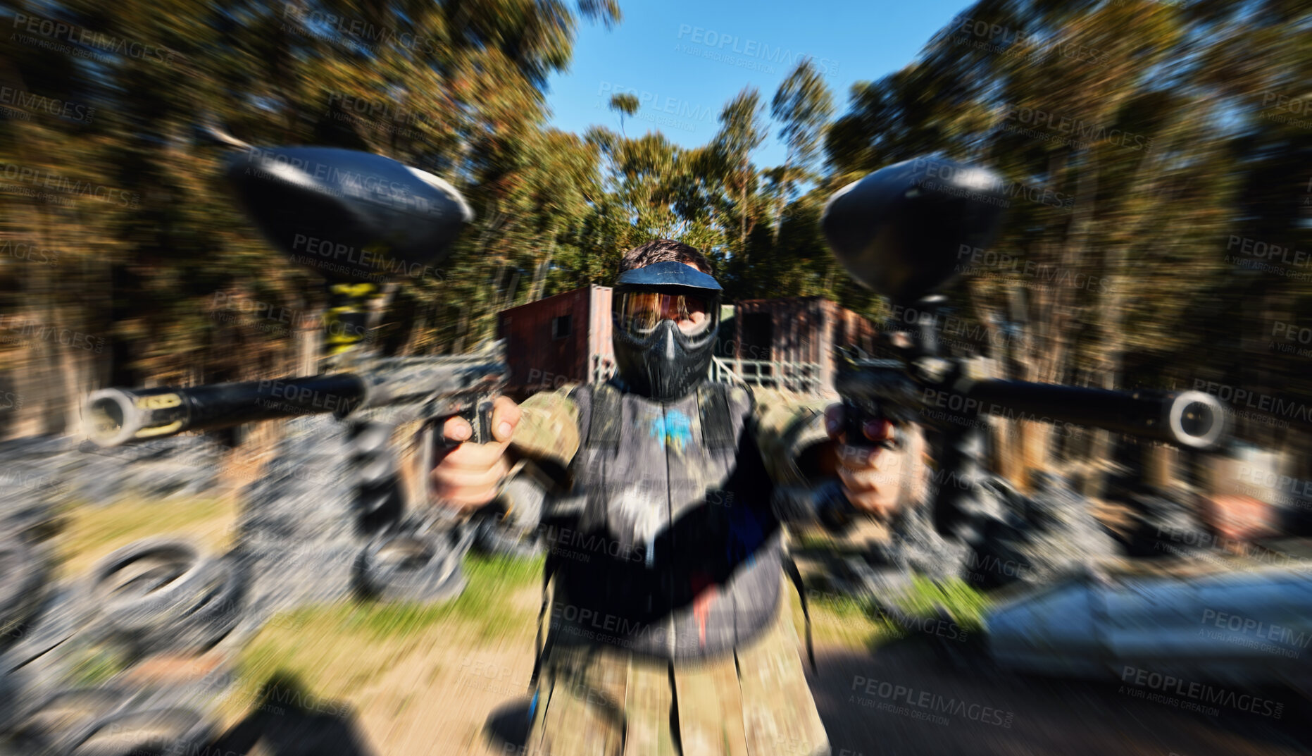 Buy stock photo Man, paintball and dual wield gun for rapid fire, intense battle or war in the forest pushing to attack. Active army soldier holding guns for fast firing in extreme adrenaline sport competition