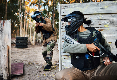 Buy stock photo Sports, paintball and woman with gun for battle, game or competition outdoors on field. War fight, military army and female soldier with weapon on shooting range while hiding from player for exercise