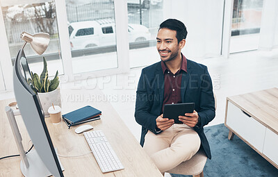 Buy stock photo Office, Indian man at desk with tablet and smile at computer, reading good news email or successful sales report online. Business, smile and communication with internet research, social media or web.