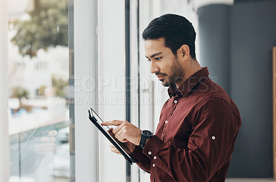 Buy stock photo Business man focus, tablet and office for reading, analysis or schedule planning for big data on app. Asian businessman, leader or brainstorming on mobile touchscreen for agenda, strategy or typing