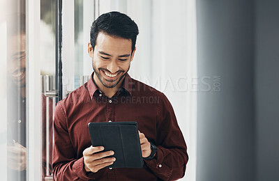 Buy stock photo Tablet, window and smile, Indian businessman, happy and reading email or funny social media meme online. Startup office, development and assessment for property design project, architect networking.