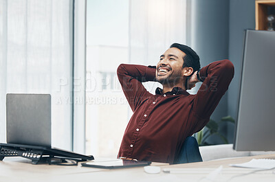Buy stock photo Smile, relax and business man in office after completing project or task in workplace. Laughing, thinking and happy male professional relaxing or resting after finishing working, goals and targets.