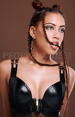 Buy stock photo Grunge, makeup and fashion for woman in studio with gen z aesthetic on brown background. Punk, rocker and edgy, cool girl posing, creative and confident with contemporary or unique style and attitude