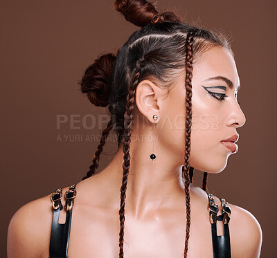 Buy stock photo Rock, fashion and woman with makeup for beauty and style isolated in a studio brown background. Unique, hairstyle and creative punk cosmetics or aesthetic and gen z female model in hipster clothes