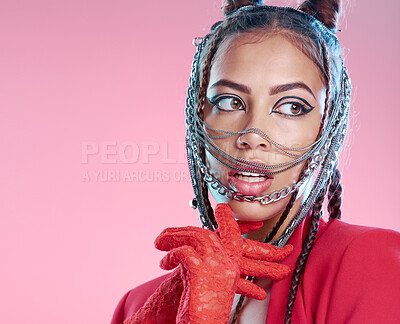 Buy stock photo Chains, rock and goth fashion by woman with unique style isolated against a studio pink background. Creative, accessories and edgy female model metal jewelry on her head and cool makeup
