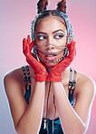 Punk, rock and red gloves of a woman with makeup, bondage and bdsm style in a studio. Isolated, pink background and metal aesthetic of a gen z person and hispanic model with leather rocker clothing 
