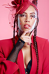 Punk, gen z and portrait of a young woman with creative, designer fashion or edgy clothing. Thinking, pink background and rock latino model with cool, rocker or funky style for beauty in a studio