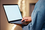 Laptop, hands typing and green screen mock up in office for advertising, marketing or product placement at night. Bokeh, branding or business woman with computer for mockup or copy space in workplace