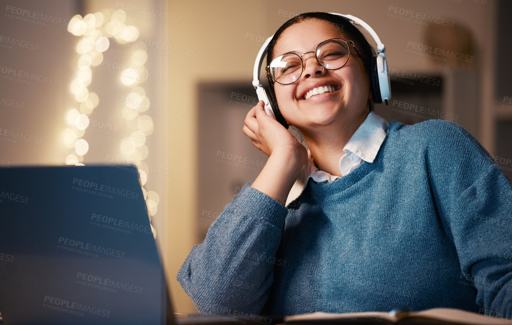 Buy stock photo Student, music headphones and woman in home at night streaming radio or podcast after elearning. Freelancer, remote worker or happy business female listening or enjoying audio, song or album in house
