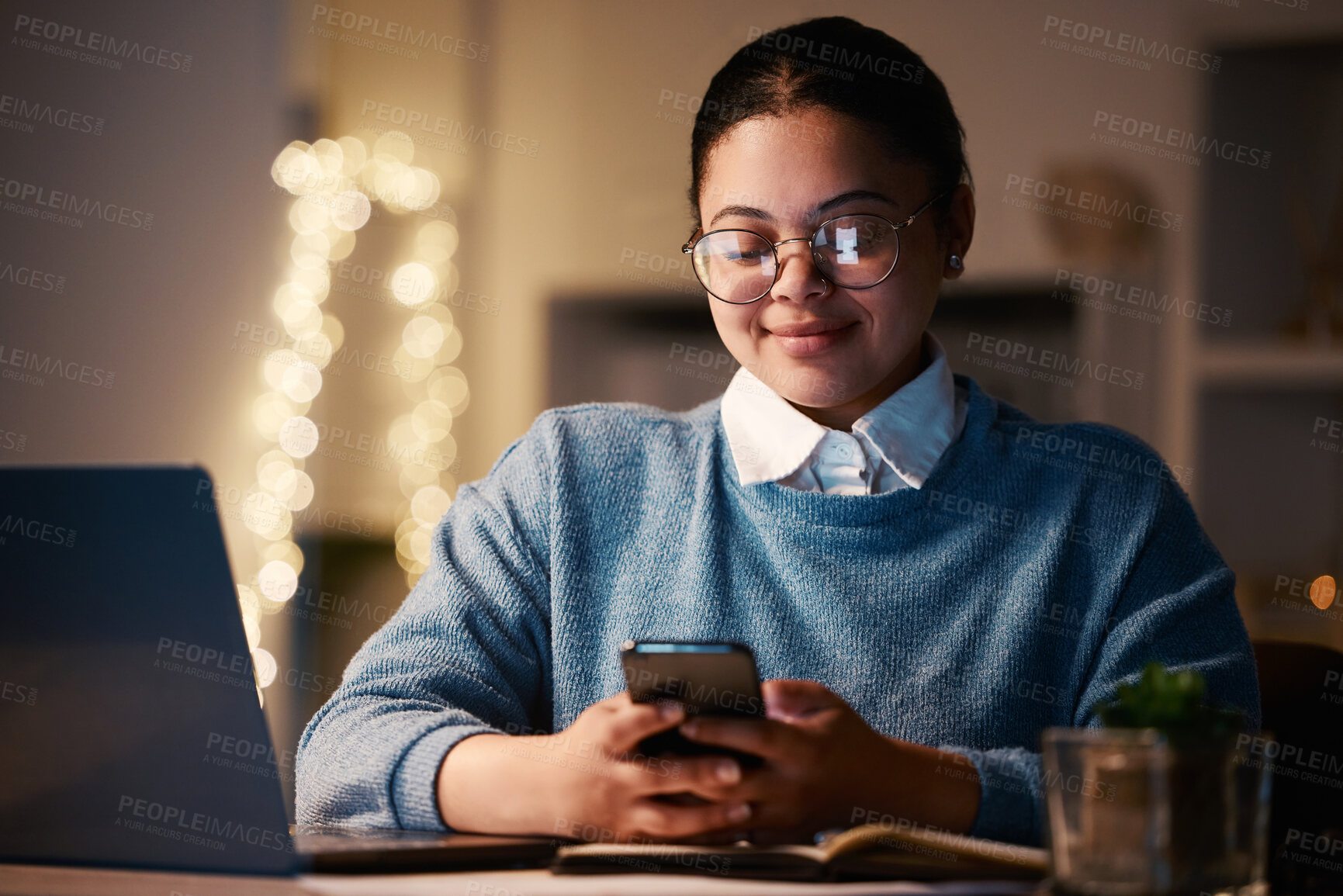 Buy stock photo Business woman, phone and typing in home office for web browsing, texting or social media. Night bokeh, cellphone and happy female, freelancer or remote worker with mobile smartphone for research.