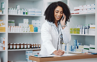 Buy stock photo Phone call, counter and pharmacist woman for medicine note, customer service or virtual healthcare support. Happy, friendly doctor, medical retail person in pharmacy talking on cellphone at help desk