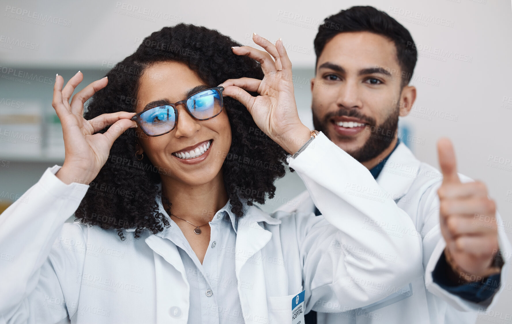 Buy stock photo Vision portrait, doctor thumbs up and smile of a female healthcare worker in a hospital. Agreement, glasses choice and happy woman looking at lens and frames options in a optometrist clinic 