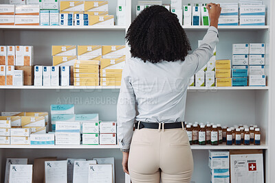 Buy stock photo Pharmacy, medicine and shelf with black woman in store for healthcare, drugs dispensary and treatment prescription. Medical, pills and shopping with pharmacist for check, label information or product