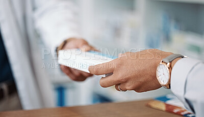 Buy stock photo Closeup, hands and prescription with customer, pharmacist and medicine in drug store. Zoom, hand and medication in clinic, pills and pharmacy for medical antibiotics product, healthcare and wellness