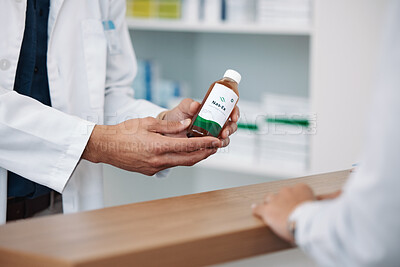 Buy stock photo Doctor, hands and prescription medicine over the counter for consultation, healthcare or pharmaceutical product at clinic. Hand of pharmacist showing medical solution for healthy cure at pharmacy