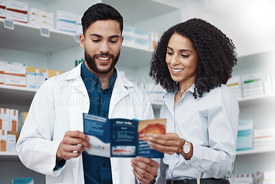 Buy stock photo Pharmacy, medicine and brochure with people in store for medical, information and shopping. Healthcare, wellness and expert with man and woman reading in dispensary for medical, product and seller