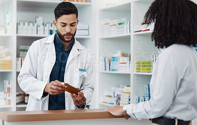Buy stock photo Pharmacy, man and customer with medicine, instructions and conversation in drug store, medical supplements and prescription. Male employee, female client and pharmacist with antibiotics or healthcare