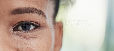 Buy stock photo Eye focus, vision zoom and mockup of a black woman outdoor with blurred background. Eyes closeup, portrait and health care for optometry and eyesight check with a young African female with mock up