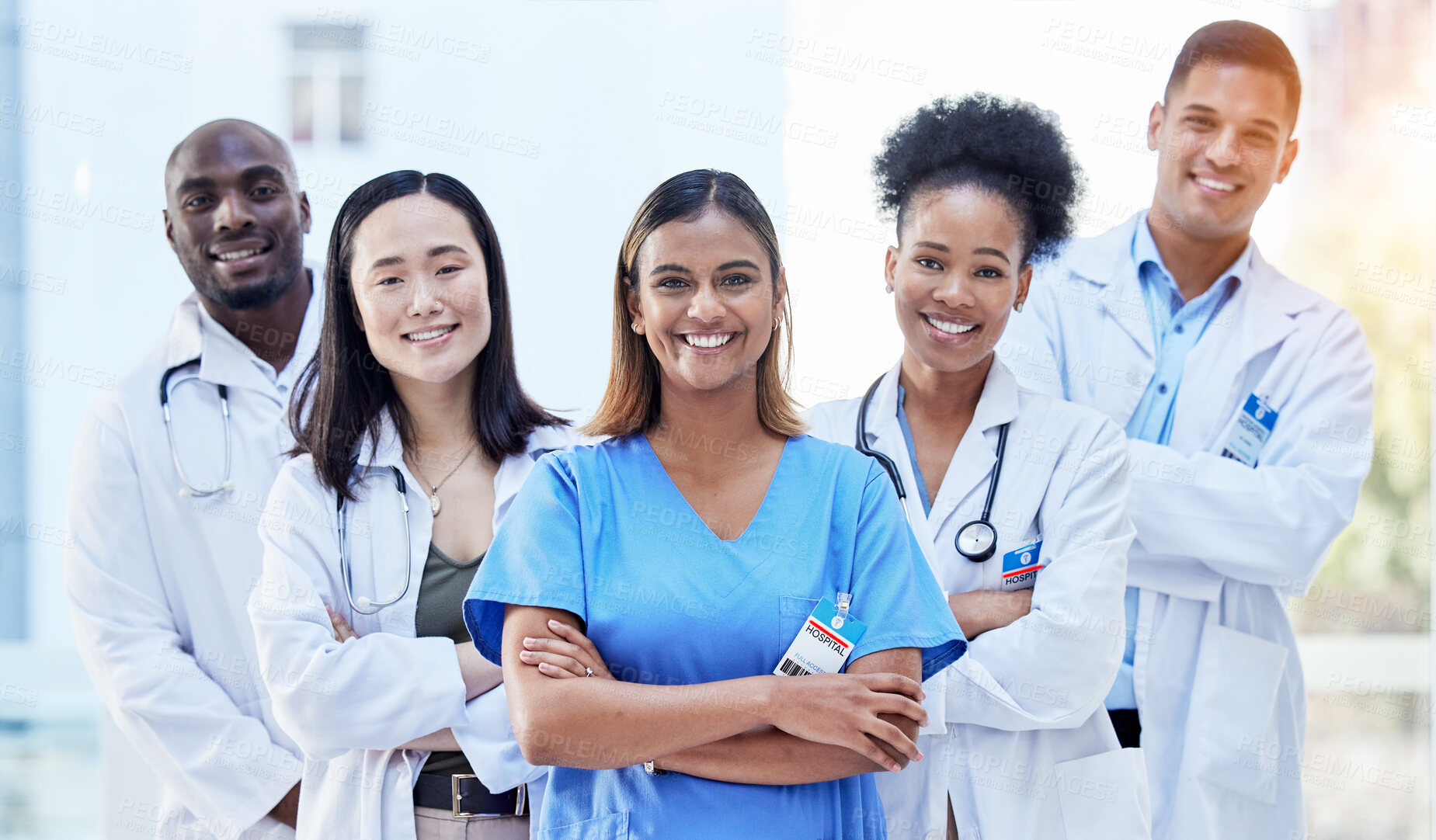 Buy stock photo Portrait, doctors and arms crossed with smile for teamwork, healthcare and hospital management. Group of happy medical employees, diversity and clinic collaboration of integrity, trust and about us 