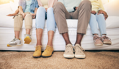 Buy stock photo Relax, legs and shoes of black family on sofa for bonding, break and rest together. Support, connection and quality time with parents and children in living room at home for comfort, care and feet