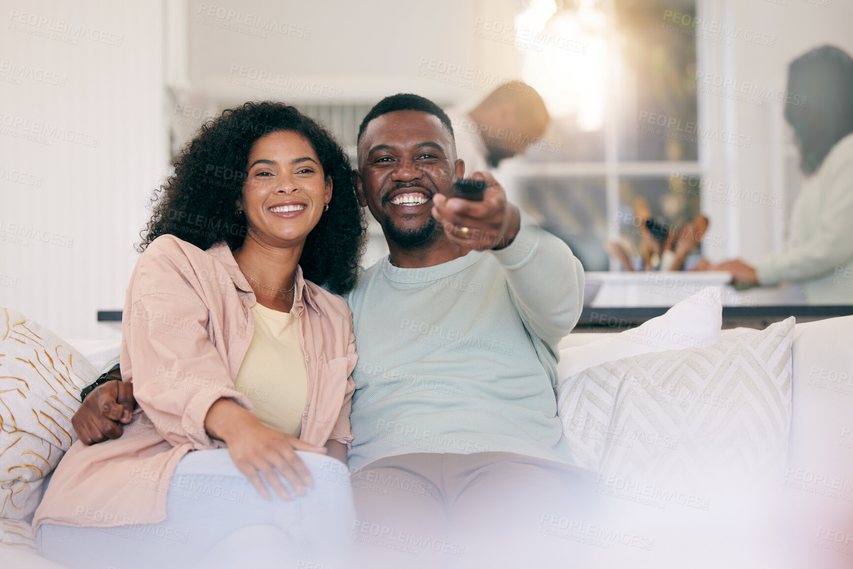 Buy stock photo Black couple on couch, watching television and remote with smile, quality time and bonding together. Love, African American man and happy woman on sofa, tv for movie and happiness to relax in lounge