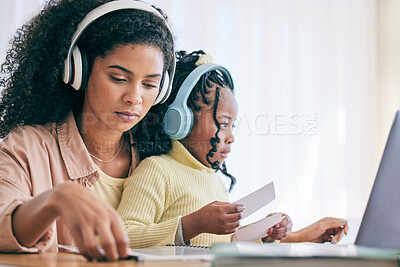 Buy stock photo Headphones, elearning and girl with mother and homework flash cards for study in a home. Online learning, digital kids app and computer of a child with a mom helping with school reading in a house