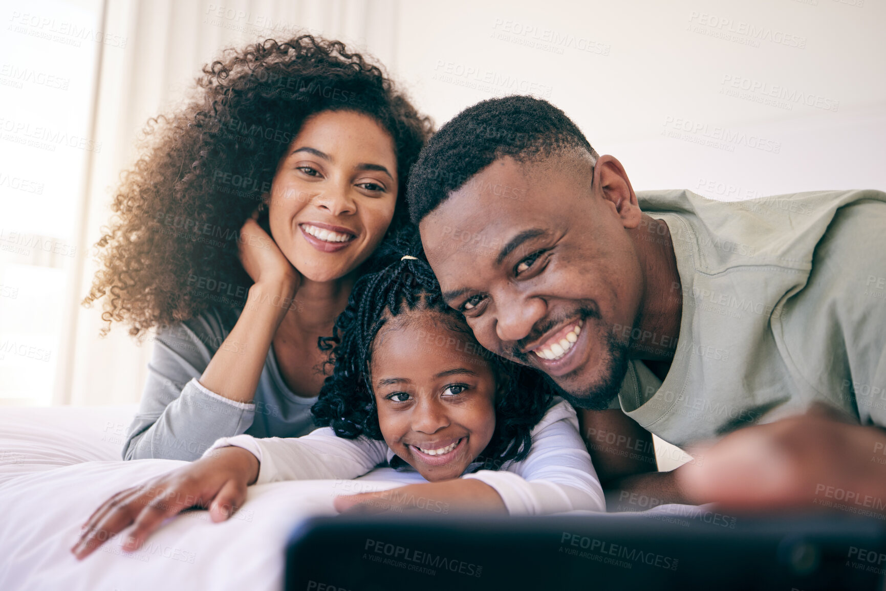 Buy stock photo Selfie, smile and black family relax in bed, happy and bonding while posing in their home. Love, girl and parents in a bedroom, resting and having fun, joy and cheerful for photo or profile picture