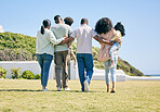 Grandparents, parents and children walking in garden for bonding, quality time and relax together. Black family, love and back of happy mom, father and kids enjoy holiday, summer vacation and weekend