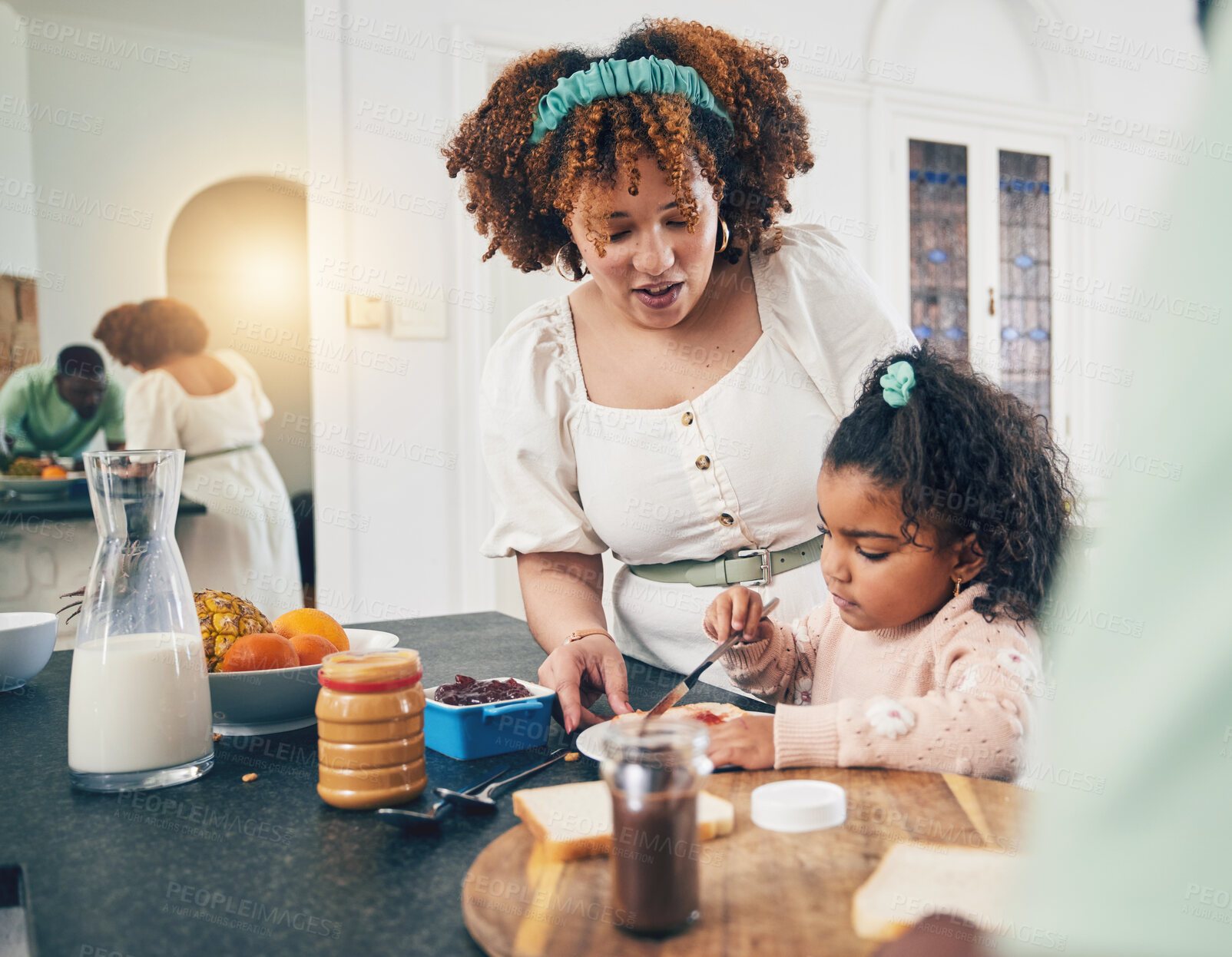 Buy stock photo Love, breakfast food and black family kid, mother or people eating meal, bonding and prepare ingredients. Morning cooking, kitchen counter or hungry mom with young child making peanut butter sandwich