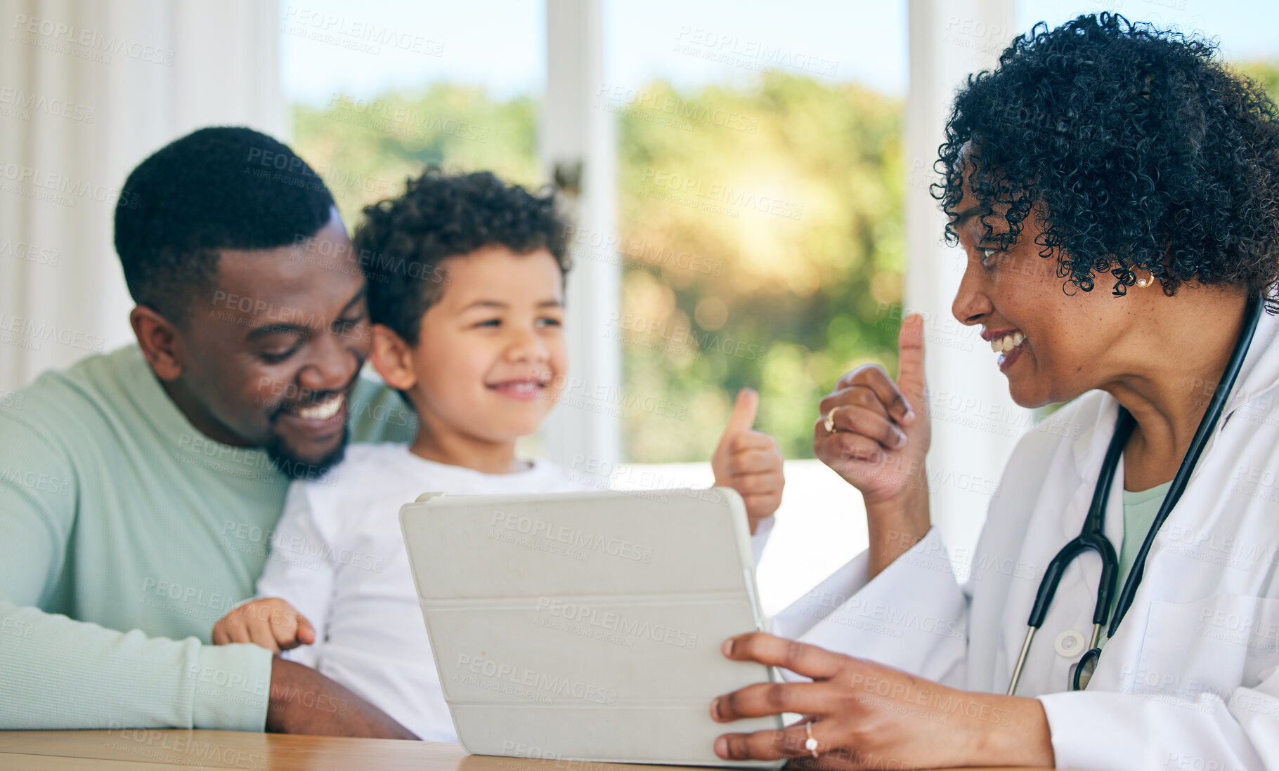 Buy stock photo Pediatrician, father and child with thumbs up from patient results on a tablet with good news. Happy kid, dad and doctor in a clinic consultation office with a healthcare worker and smile in hospital