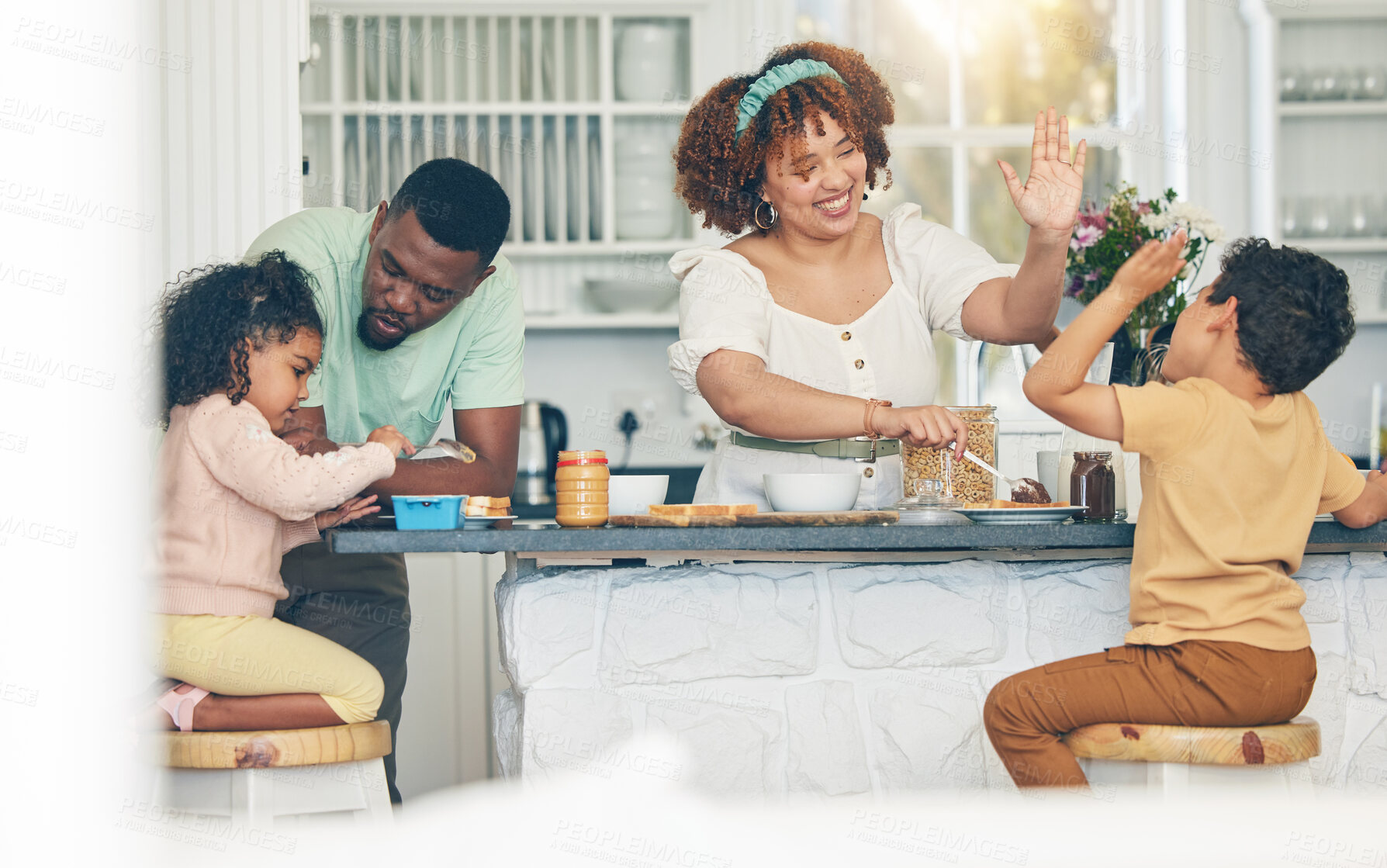 Buy stock photo Love, morning breakfast food and black family children, mother and father eating meal, bonding and prepare ingredients. High five, home kitchen or hungry mom, dad and young youth kids happy for lunch