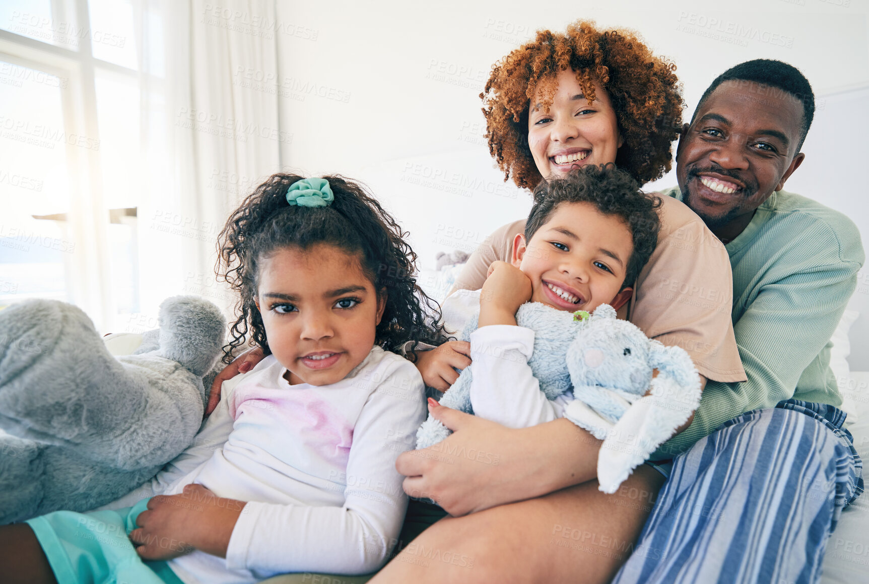 Buy stock photo Big family, portrait and bedroom with a mom, dad and children together in morning. Group hug, happiness and smile in a house with parent love, support and bonding with kids, mom and father at home