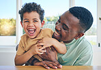 Child love, dad and black family playing, having fun and enjoy happy quality time together in Jamaica home. Father son bonding, happiness and African people, youth kid and papa tickling laughing boy