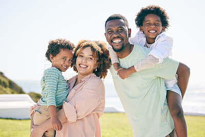 Buy stock photo Happy, love and portrait of a black family at a beach for travel, vacation and piggyback on nature in summer. Smile, face and trip with children and parents embrace and bond while traveling in Miami