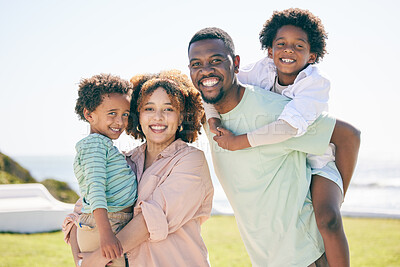 Buy stock photo Happy, smile and portrait of a black family at beach for travel, vacation and piggyback on nature background. Relax, face and trip with children and parents embrace and bond while traveling in Miami