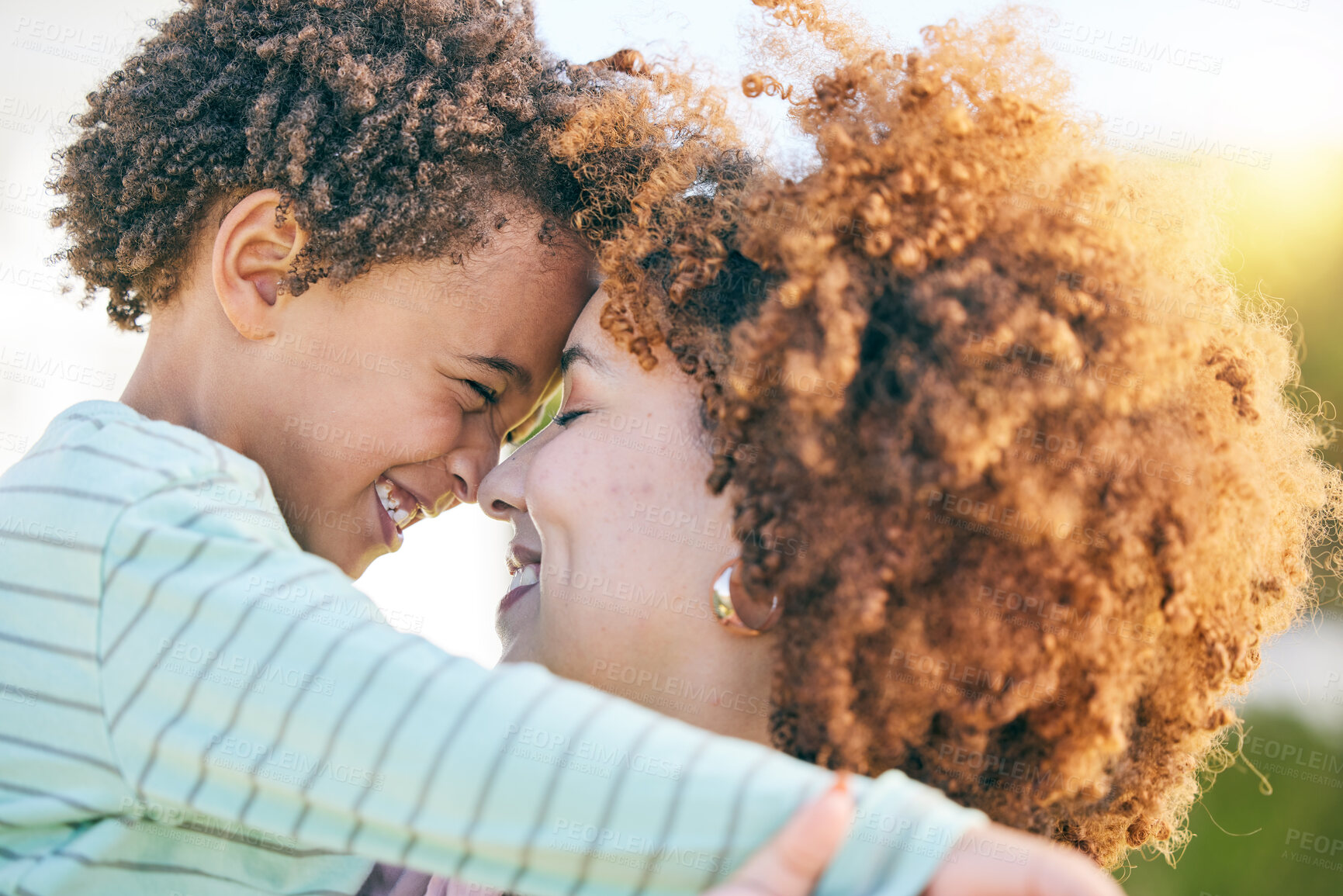 Buy stock photo Family, woman hug child with happiness and content together outdoor, face profile and forehead touch. Mother, young kid and happy people, love and care with bonding, relationship and peace with smile