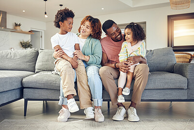 Buy stock photo Black family, love and bond on a sofa, happy and smile while talking and enjoying a morning in their home. Relax, children and parents on couch together, embrace and loving in living room on weekend