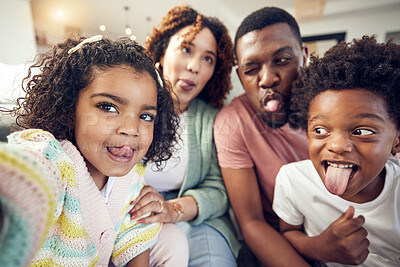 Buy stock photo Happy, tongue and selfie with black family in living room for social media, bonding and funny face. Happiness, picture and care with parents and children at home for memory, support and weekend