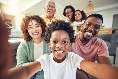 Buy stock photo Generations, smile and selfie with black family in living room for social media, bonding and relax. Happiness, picture and proud with parents and children at home for memory, support and weekend
