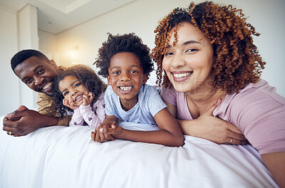 Buy stock photo Portrait, selfie and happy family relax in bed, smile and cheerful in the home during morning together. Face, photo and children resting indoors with parents and pose for profile picture and memory